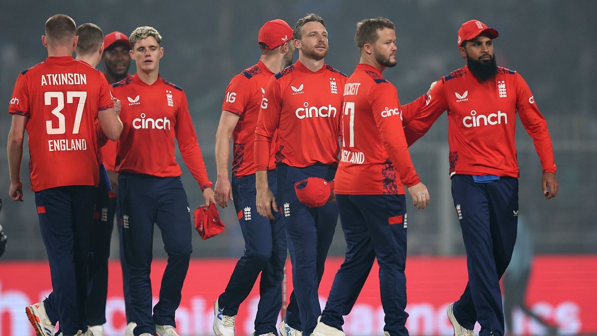 Buttler and his team-mates look on during the first T20I - null