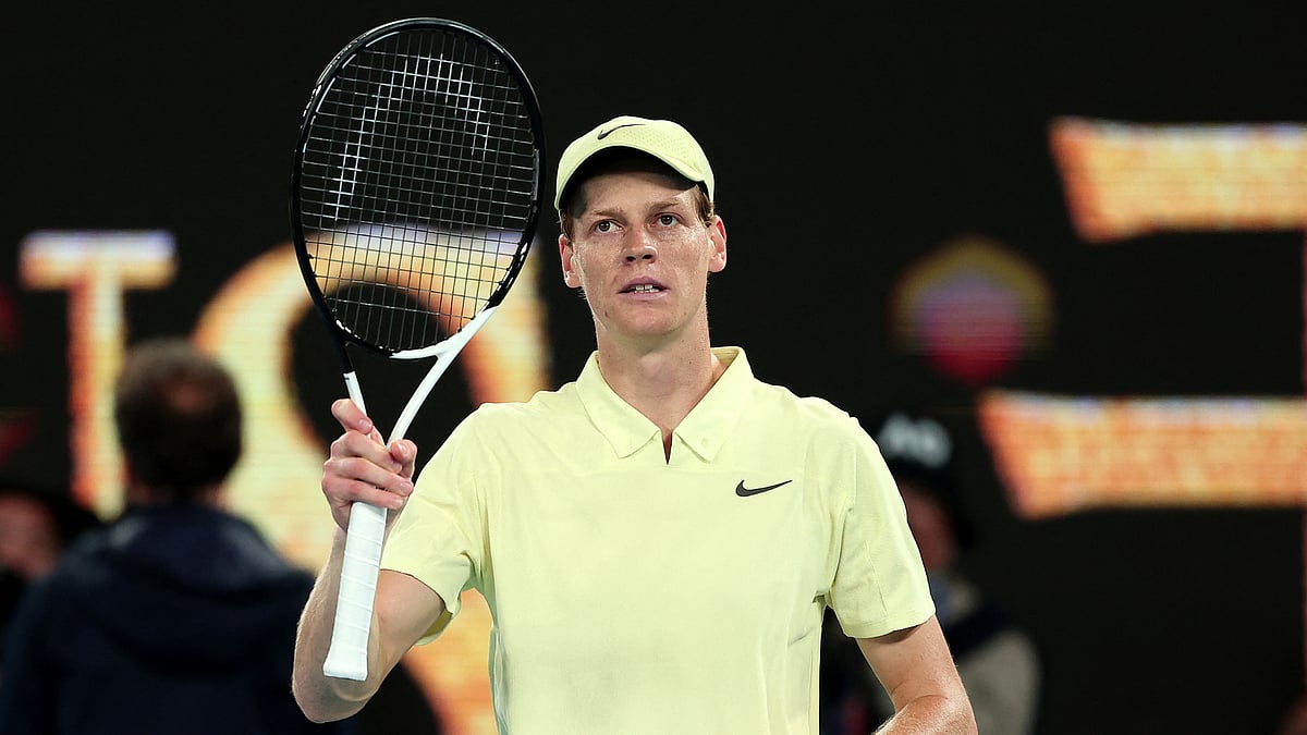 Jannik Sinner celebrates his win over Alex de Minaur at the Australian Open