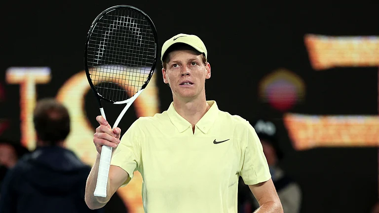 Jannik Sinner celebrates his win over Alex de Minaur at the Australian Open - null