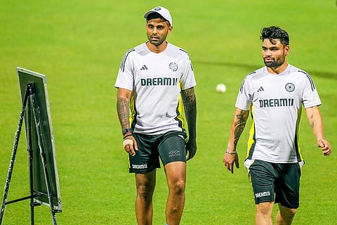 IND vs ENG T20 Series: Surya Kumar Yadav and Rinku Singh walk past a training schedule board