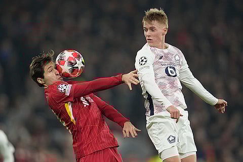 Champions League 2024–25: Federico Chiesa heads the ball as Lille's Hakon Arnar Haraldsson jumps