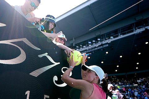 Australian Open Tennis quarterfinal: Iga Swiatek signs autographs after winning