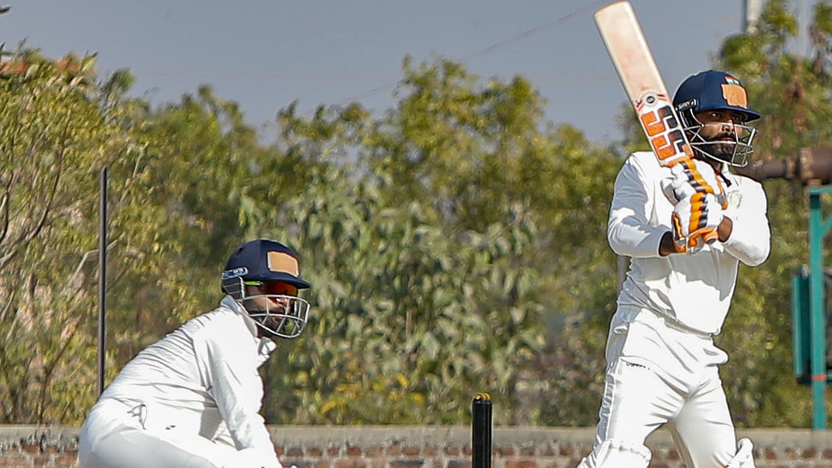 Saurashtra's Ravindra Jadeja plays a shot during the first day of Ranji Trophy cricket match between Saurashtra and Delhi, at Niranjan Shah Stadium, in Rajkot, Gujarat, Thursday, Jan. 23, 2025. - PTI