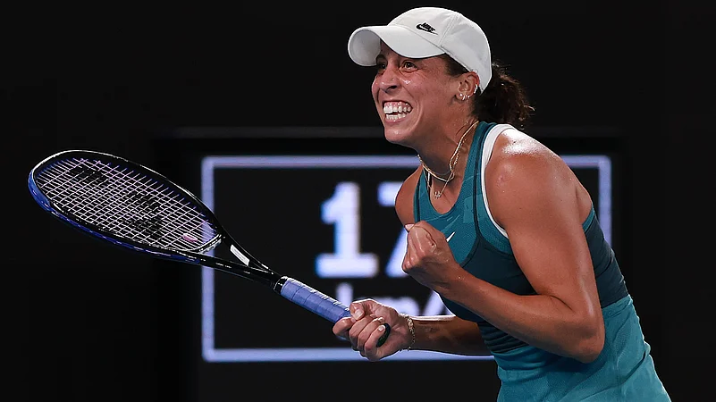 Madison Keys celebrates after winning match point against Iga Swiatek