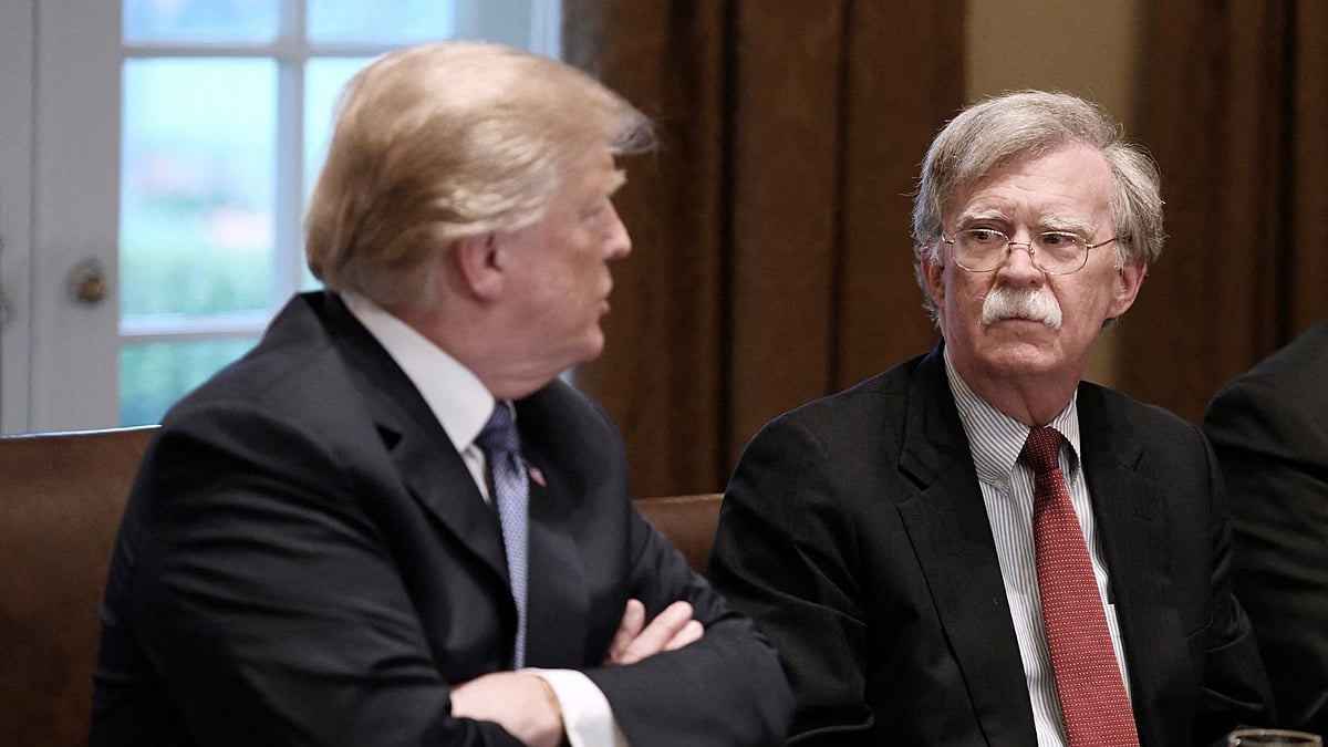 | Photo: AP : Trump Revokes Former NSA John Bolton's Secret Service Protection, Dismisses Aide As 'Dumb Guy'