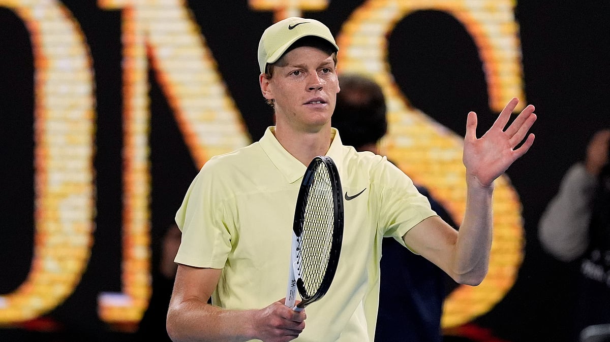 AP Photo/Asanka Brendon Ratnayake : Jannik Sinner of Italy celebrates after defeating Alex de Minaur of Australia in their quarterfinal match at the Australian Open tennis championship in Melbourne, Australia.