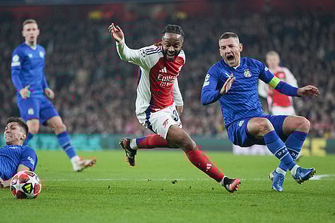 Champions League 2024-25: Arsenal's Raheem Sterling is challenged by Dinamo's Arijan Ademi
