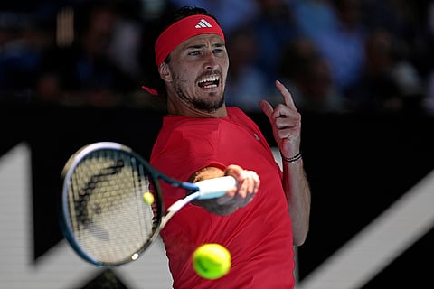AUS Open 2025 Men's Singles Semi-final: Alexander Zverev plays a forehand return to Novak Djokovic