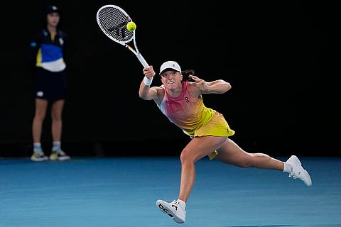 AUS Open 2025 Women's Singles Semi-final: Iga Swiatek plays a forehand return to Madison Keys