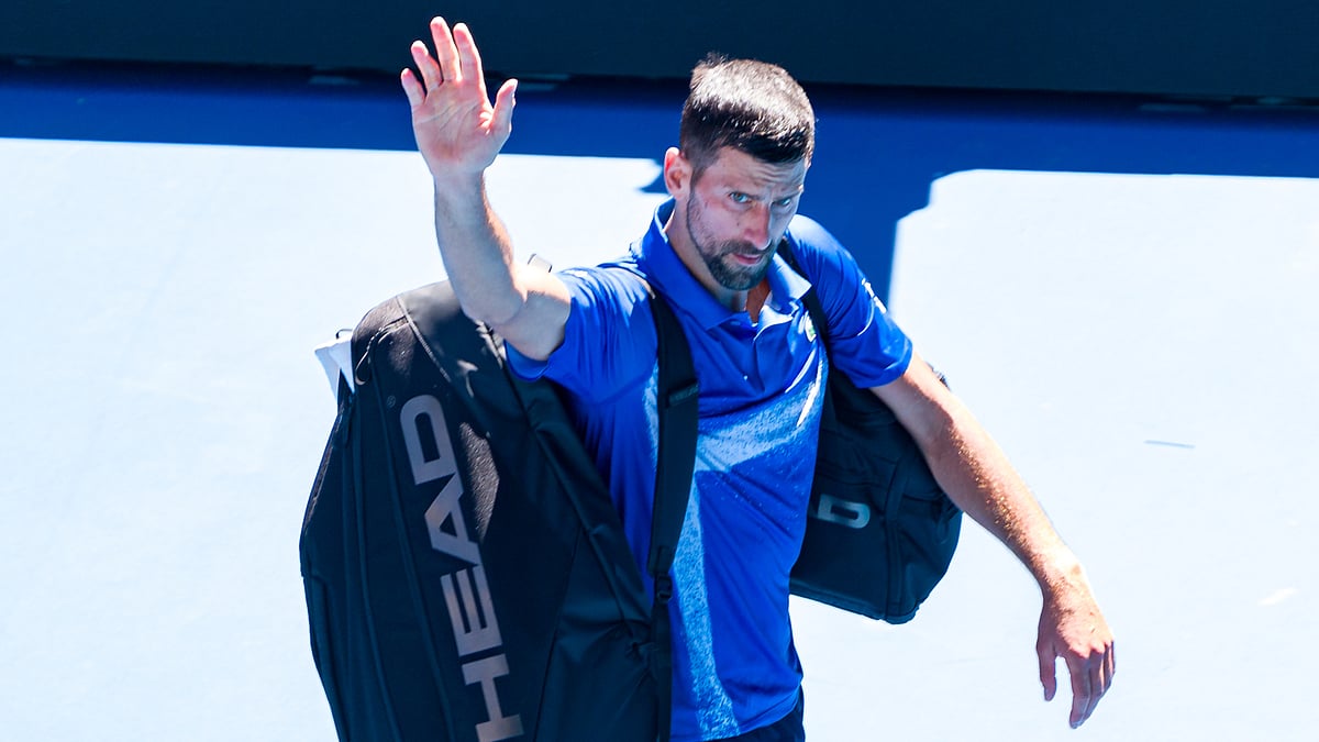 Novak Djokovic acknowledges the crowd after retiring due to injury - null