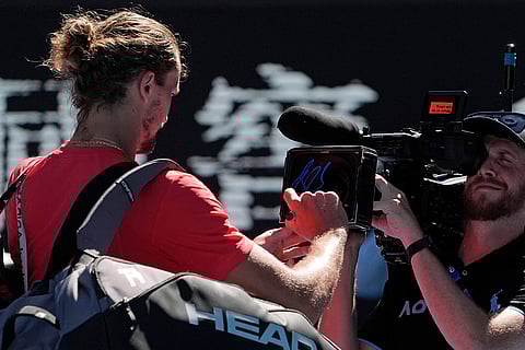 AUS Open 2025 Men's Singles Semi-final: Alexander Zverev writes on a television screen