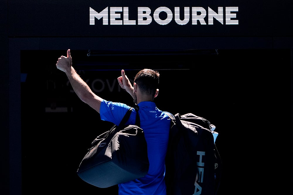 AUS Open 2025 Men's Singles Semi-final: Novak Djokovic gestures as he leaves Rod Laver Arena after retiring  - | Photo: AP/Asanka Brendon Ratnayake