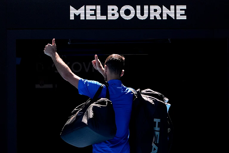 AUS Open 2025 Men's Singles Semi-final: Novak Djokovic gestures as he leaves Rod Laver Arena after retiring - | Photo: AP/Asanka Brendon Ratnayake