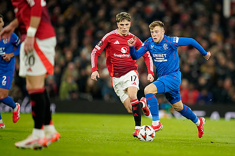 Europa League 2024-25: Connor Barron, right, and Alejandro Garnacho challenge for the ball