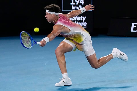 Australian Open 2025 Semi-final: Ben Shelton plays a backhand return to Jannik Sinner