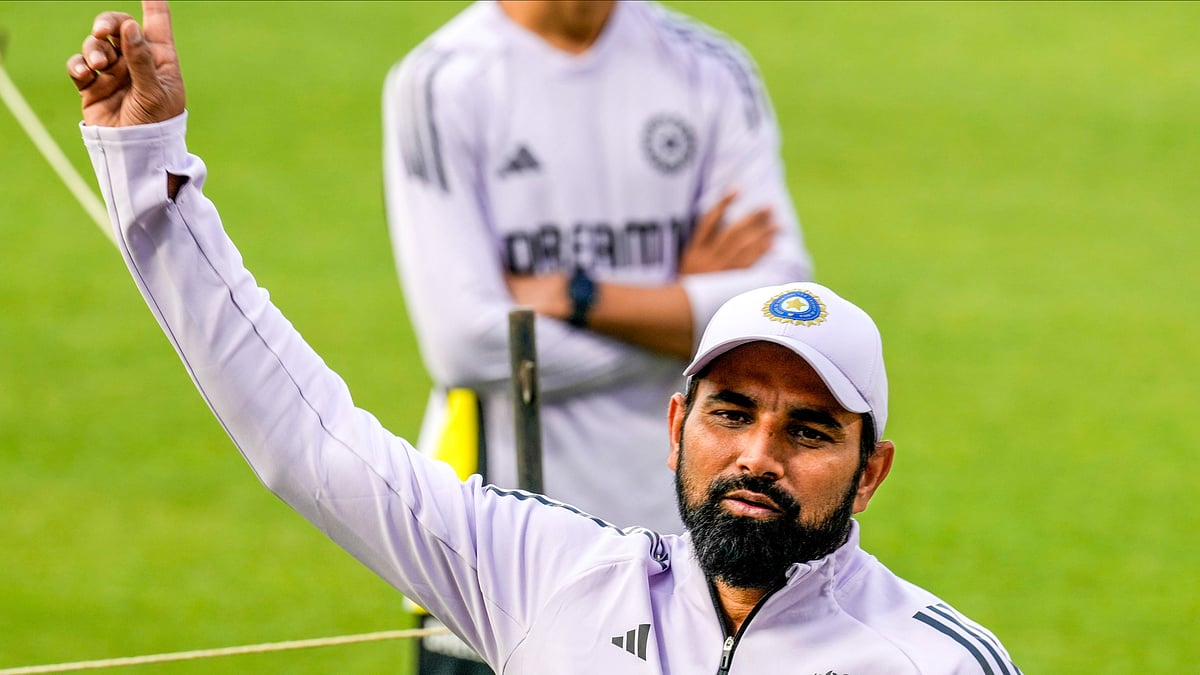 AP Photo/Bikas Das : India's Mohammed Shami gestures during the practice session ahead of their first T20 match against England, in Kolkata.