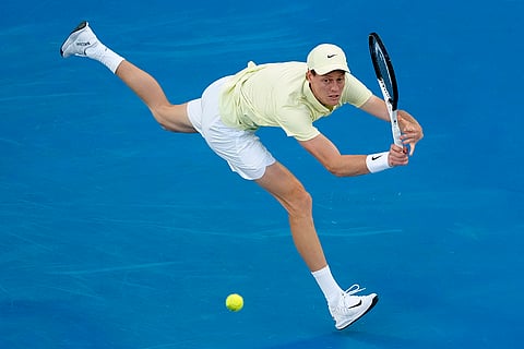 Australian Open 2025 Semi-final: Jannik Sinner plays a backhand return to Ben Shelton