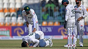 Noman Ali celebrates his fifth wicket on Saturday.