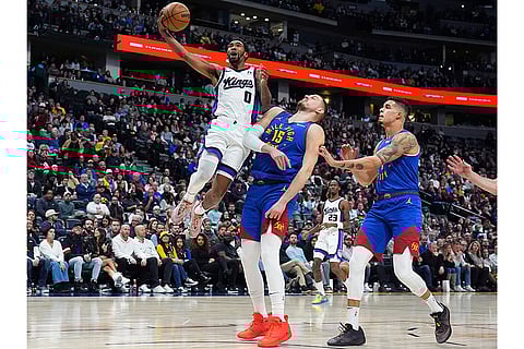 NBA Basketball 2024-25: Kings guard Malik Monk drives to the basket