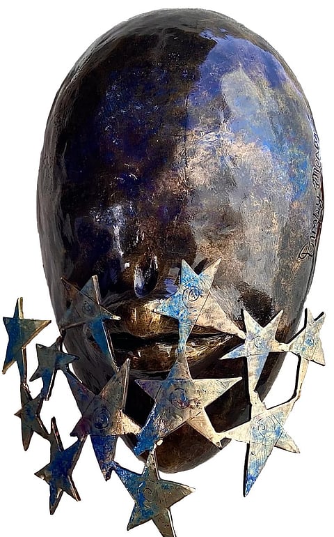Divine Whisper- a bronze sculpture by Dimpy Menon