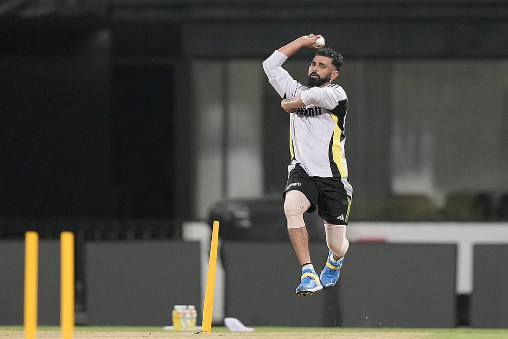 | Photo: AP/Mahesh Kumar A. : IND vs ENG 2nd T20: Mohammed Shami bowls during practice session