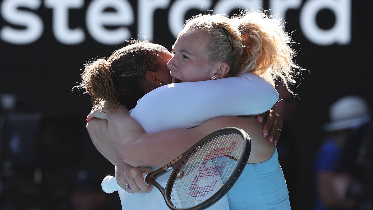 Katerina Siniakova and Taylor Townsend celebrating.