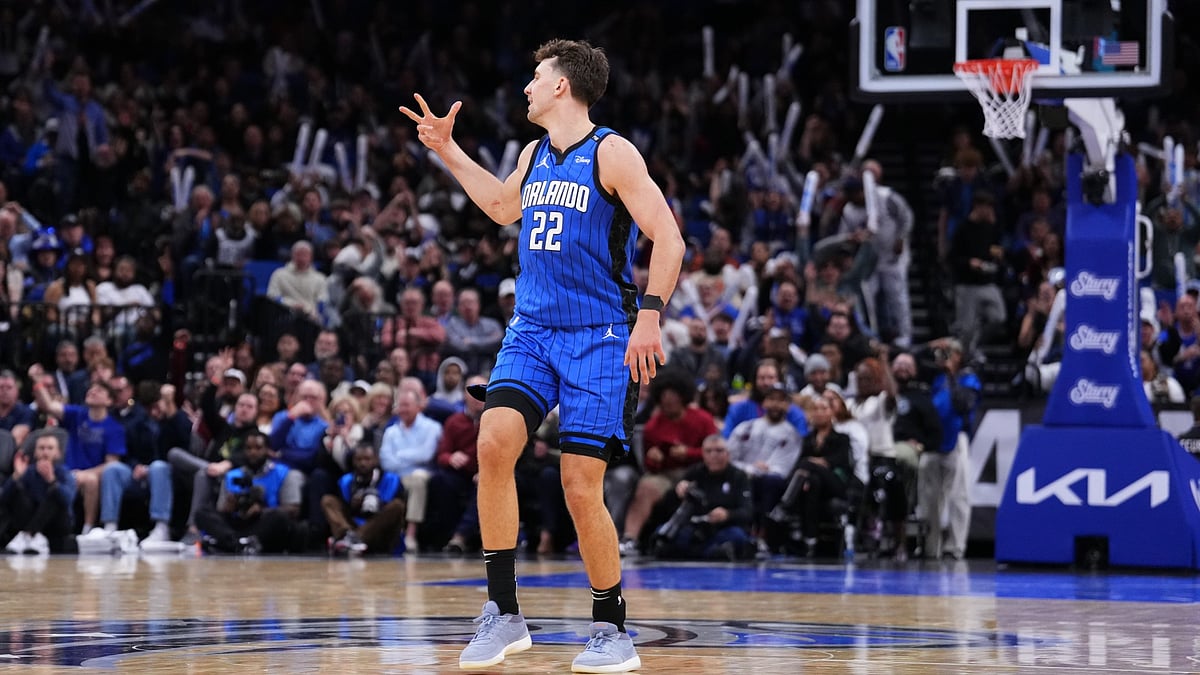 Franz Wagner #22 of the Orlando Magic reacts after scoring a three-pointer against the Detroit Pistons during the fourth quarter at Kia Center on January 25, 2025 in Orlando, Florida.