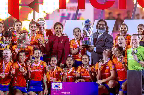 Odisha Warriors lifting the inaugural Women's Hockey India League trophy.
