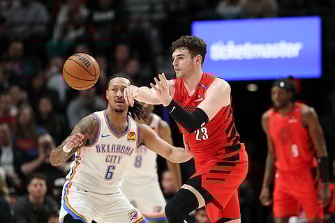 NBA 2024-25: Trail Blazers center Donovan Clingan and Oklahoma City Thunder forward Jaylin Williams