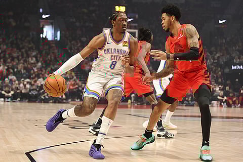 NBA 2024-25: Thunder forward Jalen Williams (8) drives to the basket