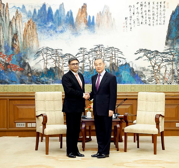 PTI : In this image posted by @China_Amb_India via X on Jan. 27, 2025, Chinese Foreign Minister Wang Yi and India's Foreign Secretary Vikram Misri during a meeting, in Beijing, Monday, Jan. 27, 2025.