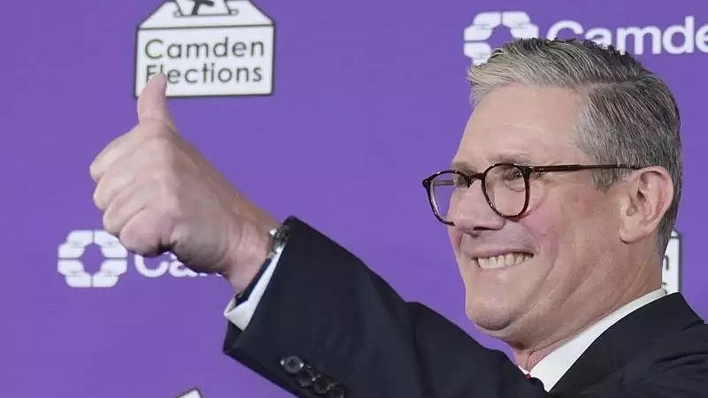 Photo- AP : “We stand ready to use industrial policy to help shelter British business from the storm,” Starmer said