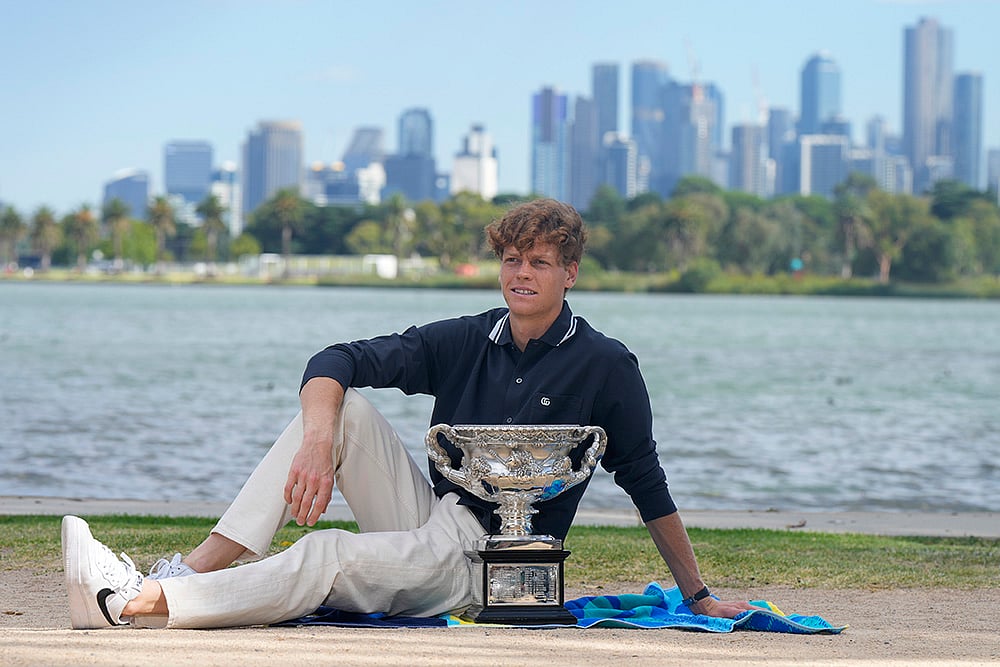 | Photo: AP/Mark Baker : Australian Open 2025: Jannik Sinner poses with Norman Brookes Challenge Cup