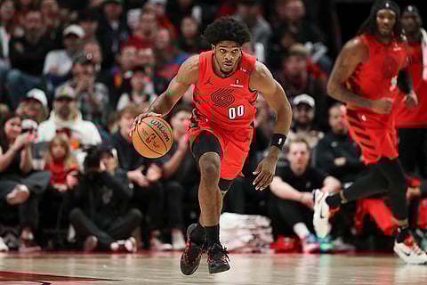 NBA 2024-25: Trail Blazers guard Scoot Henderson (00) brings the ball up court