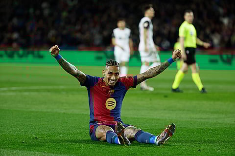 La Liga 2024-25: Barcelona's Raphinha celebrates his side's fifth goal