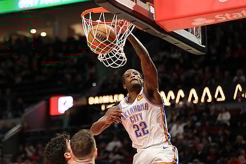 NBA 2024-25: Oklahoma City Thunder guard Cason Wallace (22) dunks