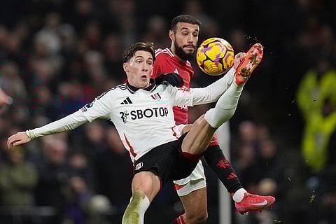 EPL 2024-25: Fulham's Harry Wilson and Man United's Noussair Mazraoui fight for the ball