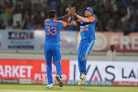 IND vs ENG 3rd T20: Hardik Pandya, left, and Abhishek Sharma celebrate the wicket of England's Phil Salt