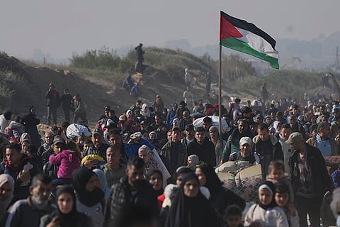 Displaced Palestinians begin return to northern Gaza