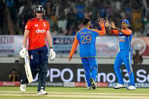 IND vs ENG 3rd T20: Varun Chakravarthy and India's Suryakumar Yadav celebrate the wicket of England's Jamie Smith