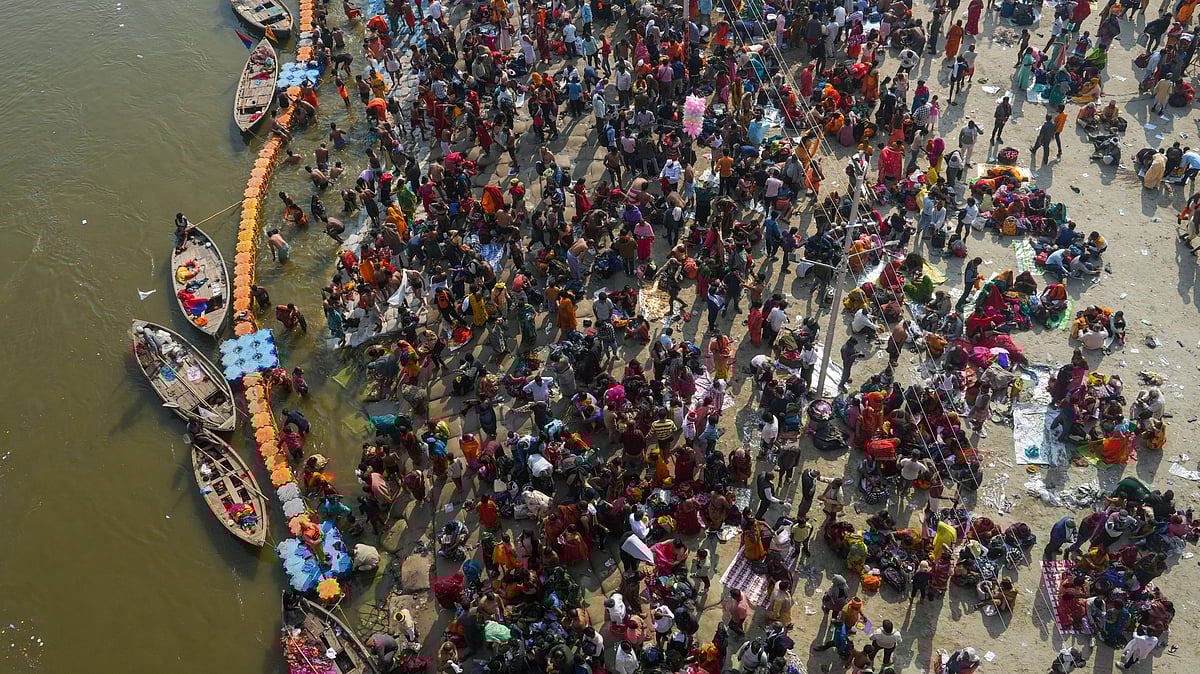 PTI : Devotees gather to take holy dip at the Sangam on the eve of 'Mauni Amavasya', during the Maha Kumbh Mela 2025, in Prayagraj, Uttar Pradesh, Tuesday, Jan. 28, 2025. 