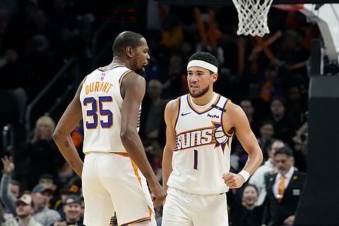 NBA 2024-25: Suns guard Devin Booker (1) celebrates his score against the Clippers