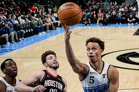 NBA 2024-25: Hawks guard Dyson Daniels (5) shoots against the Rockets