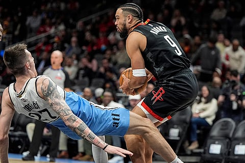 NBA 2024-25: Rockets forward Dillon Brooks (9) shoots against Hawks