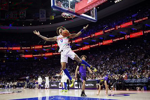 NBA 2024-25: 76ers' Kelly Oubre Jr. reacts after a dunk