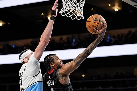 NBA 2024-25: Rockets guard Jalen Green (4) shoots against Hawks