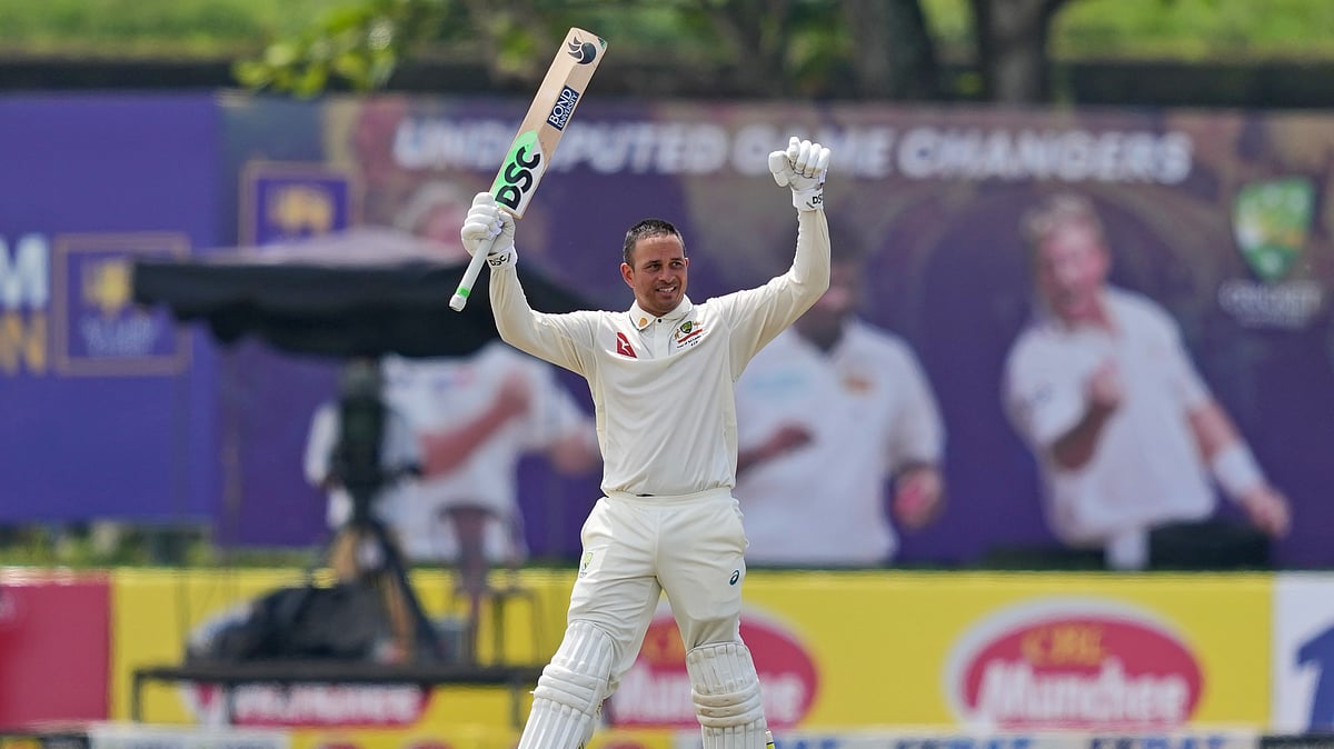 AP Photo/Eranga Jayawardena : Australia's Usman Khawaja celebrates after scoring a double century during day two of the first test cricket match between Sri Lanka and Australia in Galle.