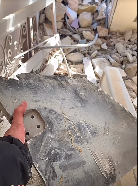 A part of the bomb which destroyed Sanad's home