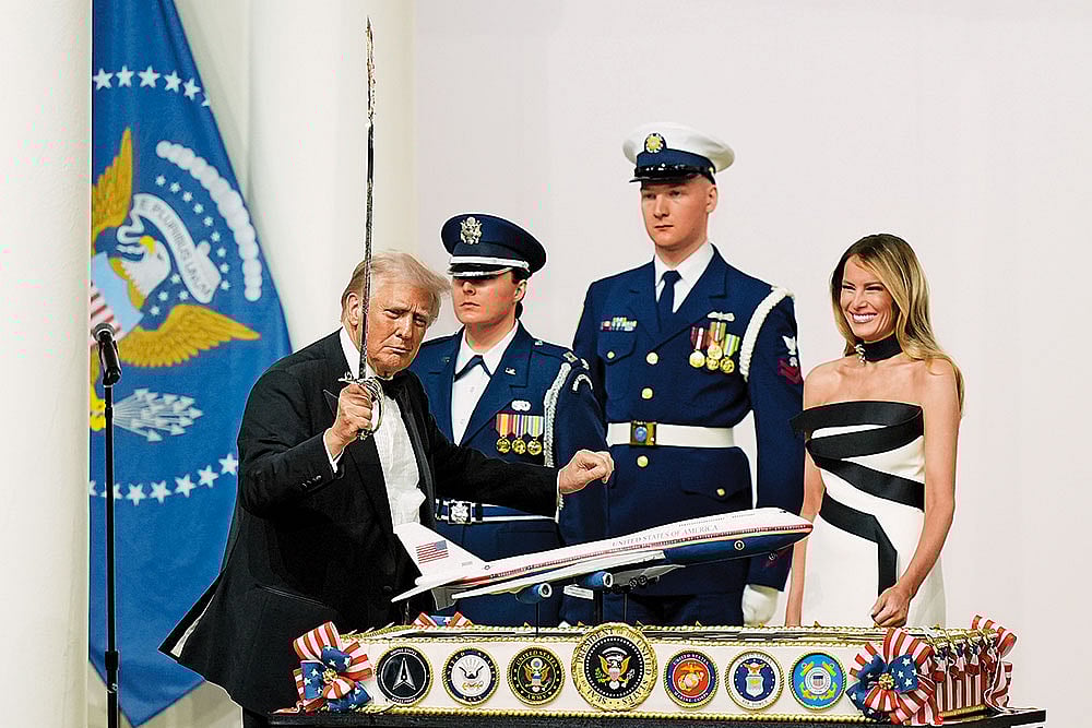 Slicing the Past: President Donald Trump holds a sabre in Washington on January 20 - | Photo: AP