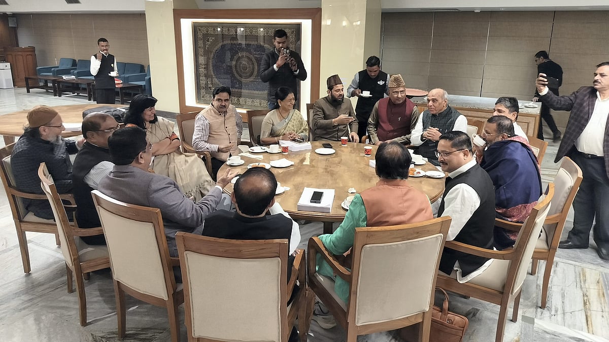 | PTI : Members of the Joint Parliamentary Committee share a light moment during a meeting on the Waqf Amendment Bill.